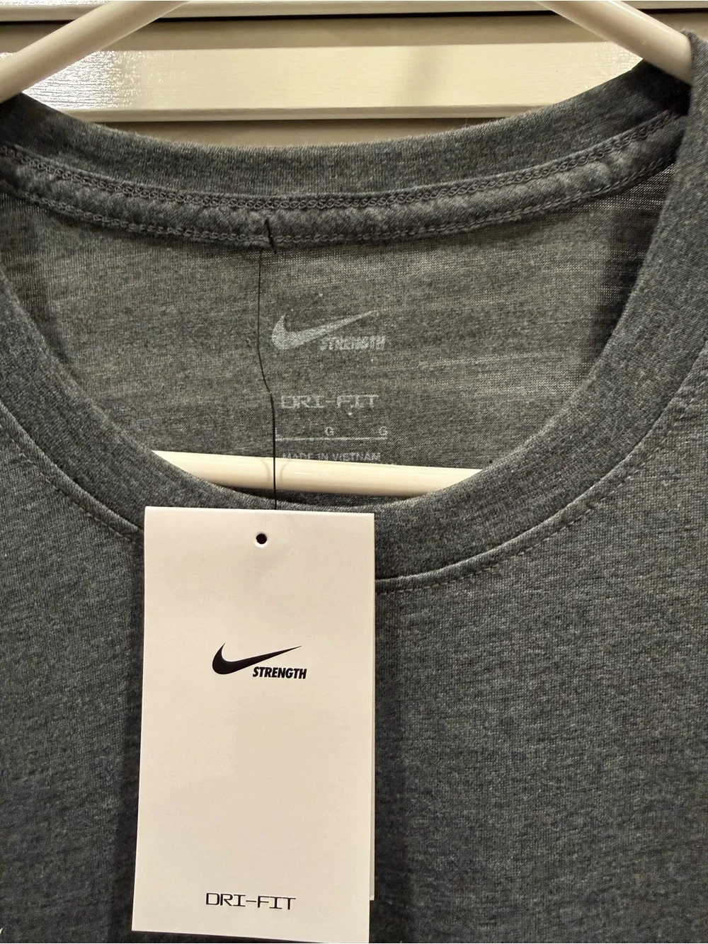Nike Gray 'Strength' Short Sleeve Crew Tee with White Swoosh